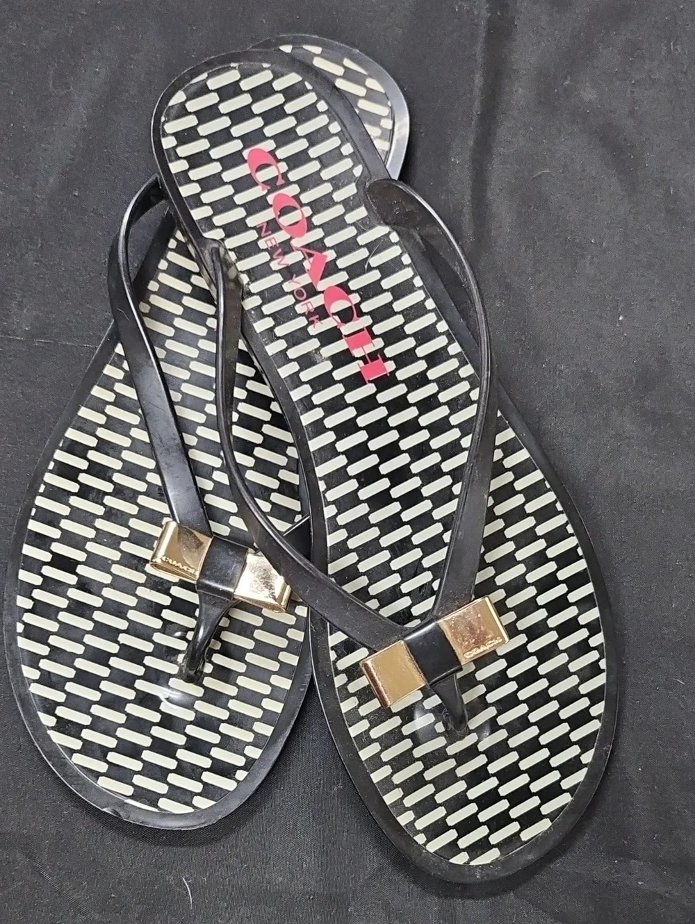 Coach Black Flip Flop Sandals with Gold Bow Accent